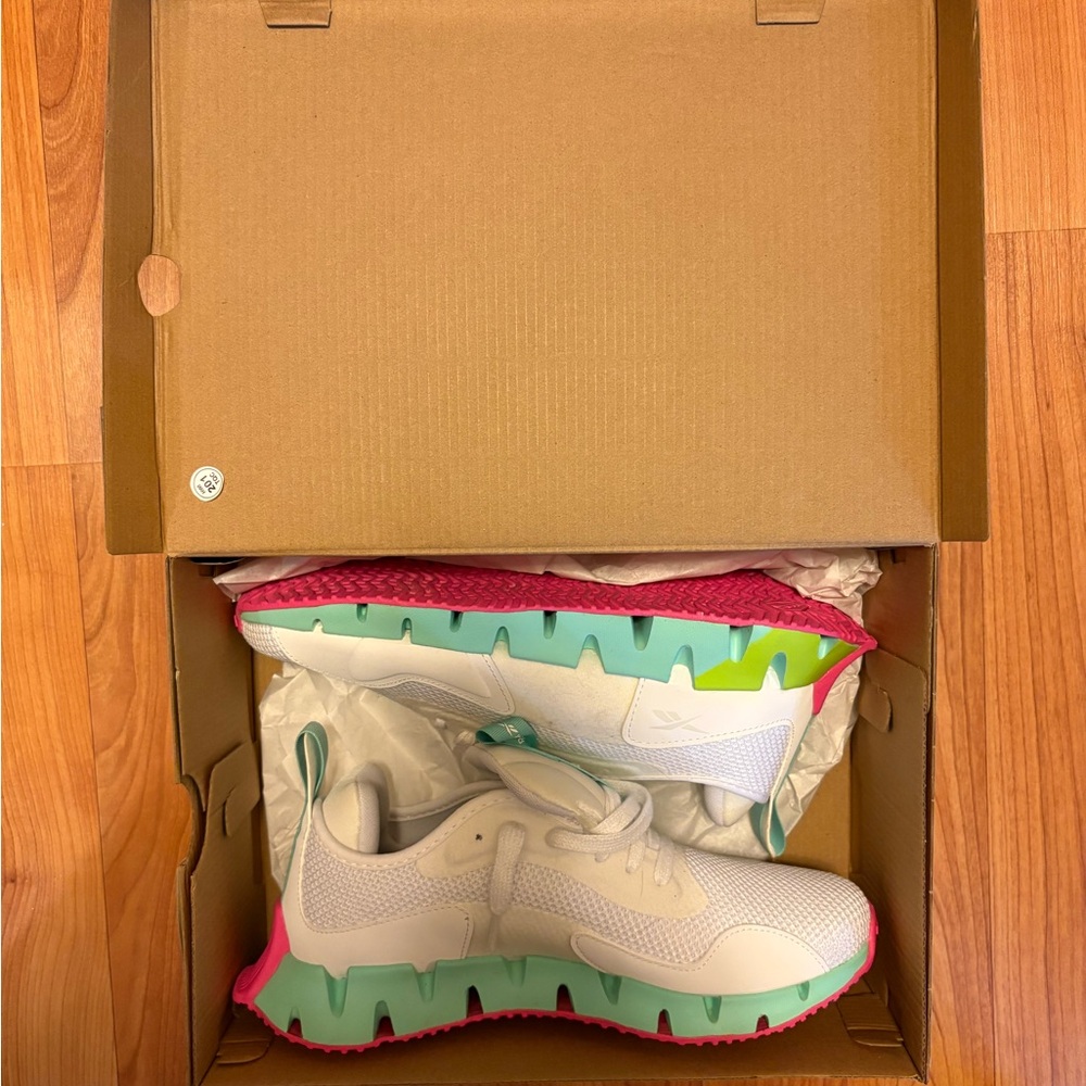 Reebok ZigTech running shoe in white, blue, hot pink